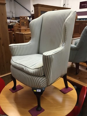 Lot 945 - Edwardianwing chair with striped upholstery on cabriole legs