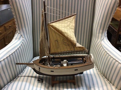 Lot 504 - Wooden model sailing boat, "spray" on stand together with musical influence metal magazine stand