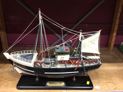 Lot 513 - A wooden model trawler, two display case clocks, "Rolls Royce and The Rocket", plus three other display cases