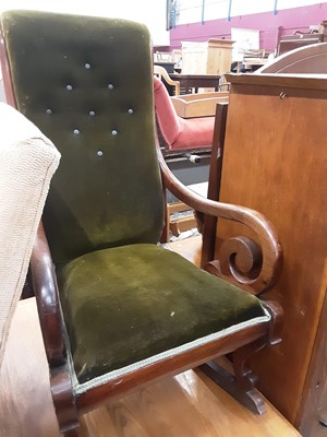 Lot 1005 - Victorian mahogany framed rocking chair with buttoned green upholstery and scroll arms