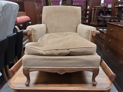 Lot 1006 - Two similar deep armchairs with beige upholstery on cabriole front legs