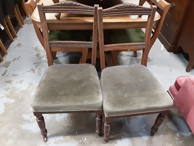 Lot 1008 - Set of four Late Victorian dining chairs with green upholstered seats on turned front legs and castors