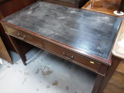 Lot 1012 - Early 20th century mahogany writing table with inset leather lined top, two drawers below on square taper legs with spade feet, 107cm wide, 61cm deep, 77cm high