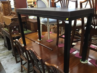 Lot 946 - Contemporary leather topped hall table on ebonised legs 122 cm wide