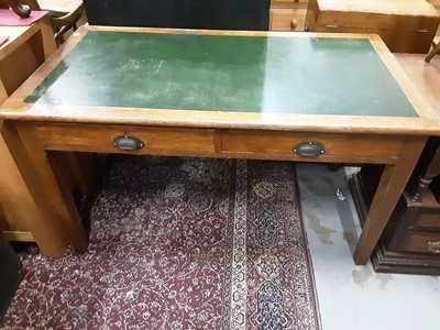 Lot 1029 - Early 20th century oak writing table with inset top, two drawers below on square taper legs, 136.5cm wide, 76cm deep, 77cm high