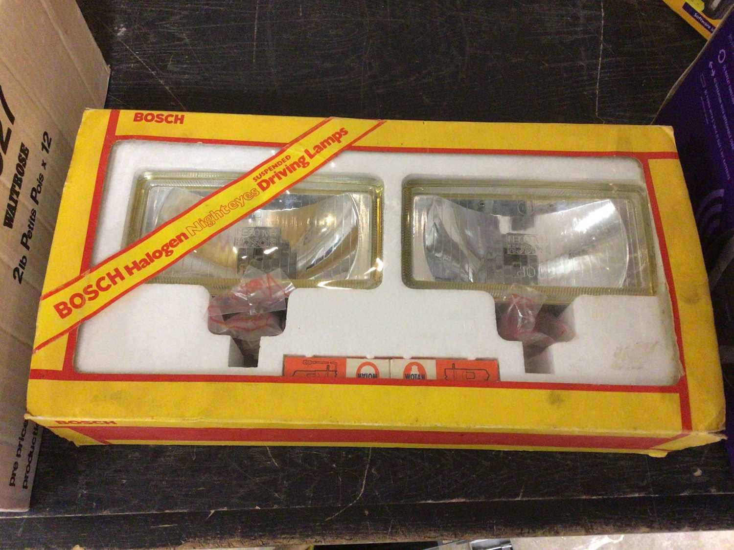 Lot 166 - Pair 1970s Bosch halogen car driving lamps in box- new un-used