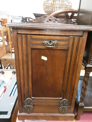 Lot 1034 - Edwardian walnut coal purdonium together with an oak bedside cupboard (2)