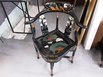 Lot 1040 - Oriental black lacquered corner elbow chair with bird and floral decoration together with a latge dressing mirror with chinoiserie decoration, 66cm wide, 132cm high (2)