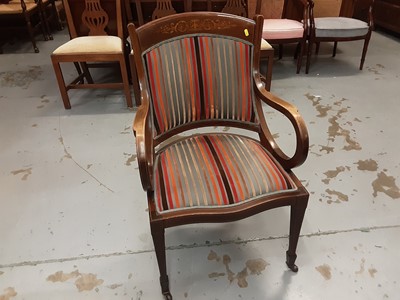 Lot 836 - Edwardian inlaid mahogany elbow chair with striped upholstery on square taper front legs and castors