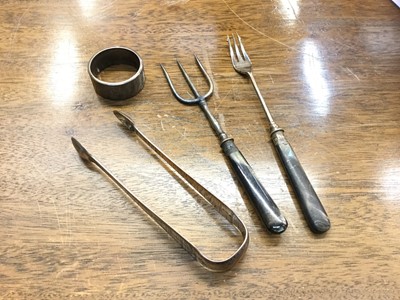 Lot 690 - Pair of Georgian silver sugar tongs, silver napkin ring and two silver plated serving forks