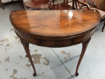 Lot 829 - Good quality walnut demi lune card table with foldover top, single drawer below on slender legs, 94cm wide, 77cm high, opening to 95cm diameter