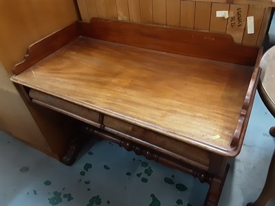 Lot 828 - Victorian mahogany writing table with ledge back, two frieze drawers below on shaped pierced end standards joined by turned stretcher, 107cm wide, 52cm deep, 89cm high