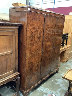 Lot 959 - Good quality 1920's/1930's walnut triple wardrobe designed & executed by Bartholomew & Fletcher, London, 153cm wide, 54cm deep, 190cm high