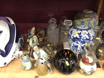 Lot 558 - Four glass decanters, brass bulls, blue and white goldfish pattern pot and lid, treen, ceramics and Tefal iron