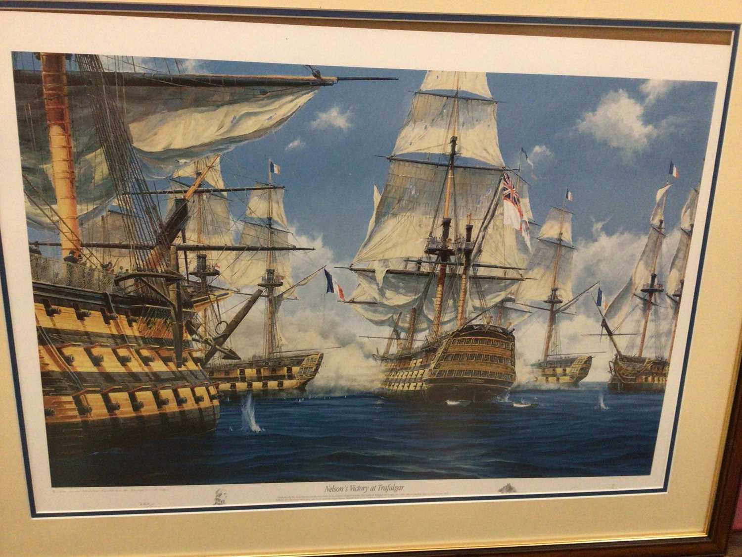 Lot 559 - Two limited edition Naval Battle scenes "Trafalgar" and "Nile", plus Spitfire in flight by Barrie A.F.Clark, The Swordfish attack at Taranto signed by Robert Taylor and a selection of smaller pictu...