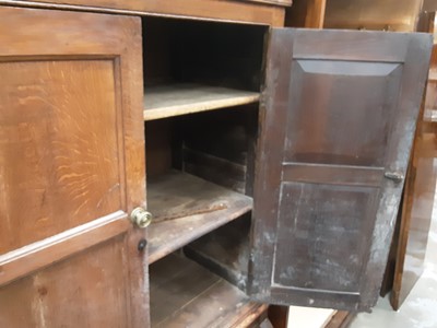 Lot 960 - Antique oak chest on stand with shelved interior enclosed by two panelled doors, 101cm wide, 50cm deep, 162.5cm high