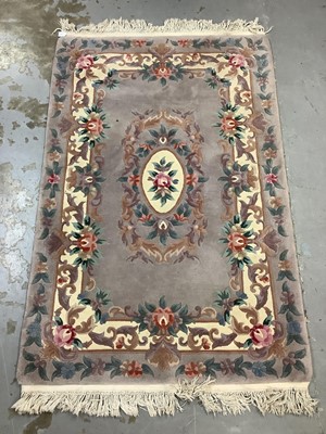 Lot 1060 - Chinese rug with floral decoration, 191cm x 122cm