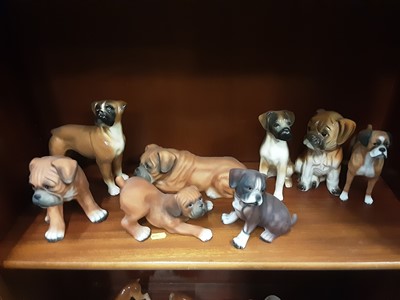 Lot 468 - Collection of porcelain dog ornaments