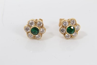 Lot 21 - 18ct gold diamond and emerald flower head cluster pendant on chain and pair matching earrings