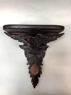 Lot 2516 - Black Forest carved wood wall bracket with an Eagle