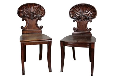 Lot 1333 - Matched pair of William IV mahogany hall chairs