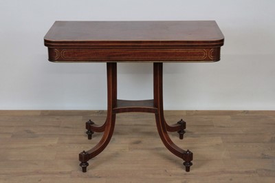 Lot 1336 - Regency mahogany and brass strung tea table