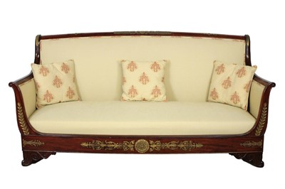 Lot 1339 - Empire-style mahogany framed and brass mounted day bed, upholstered in cream