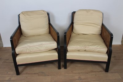 Lot 1352 - Pair of ebonised bergère chairs