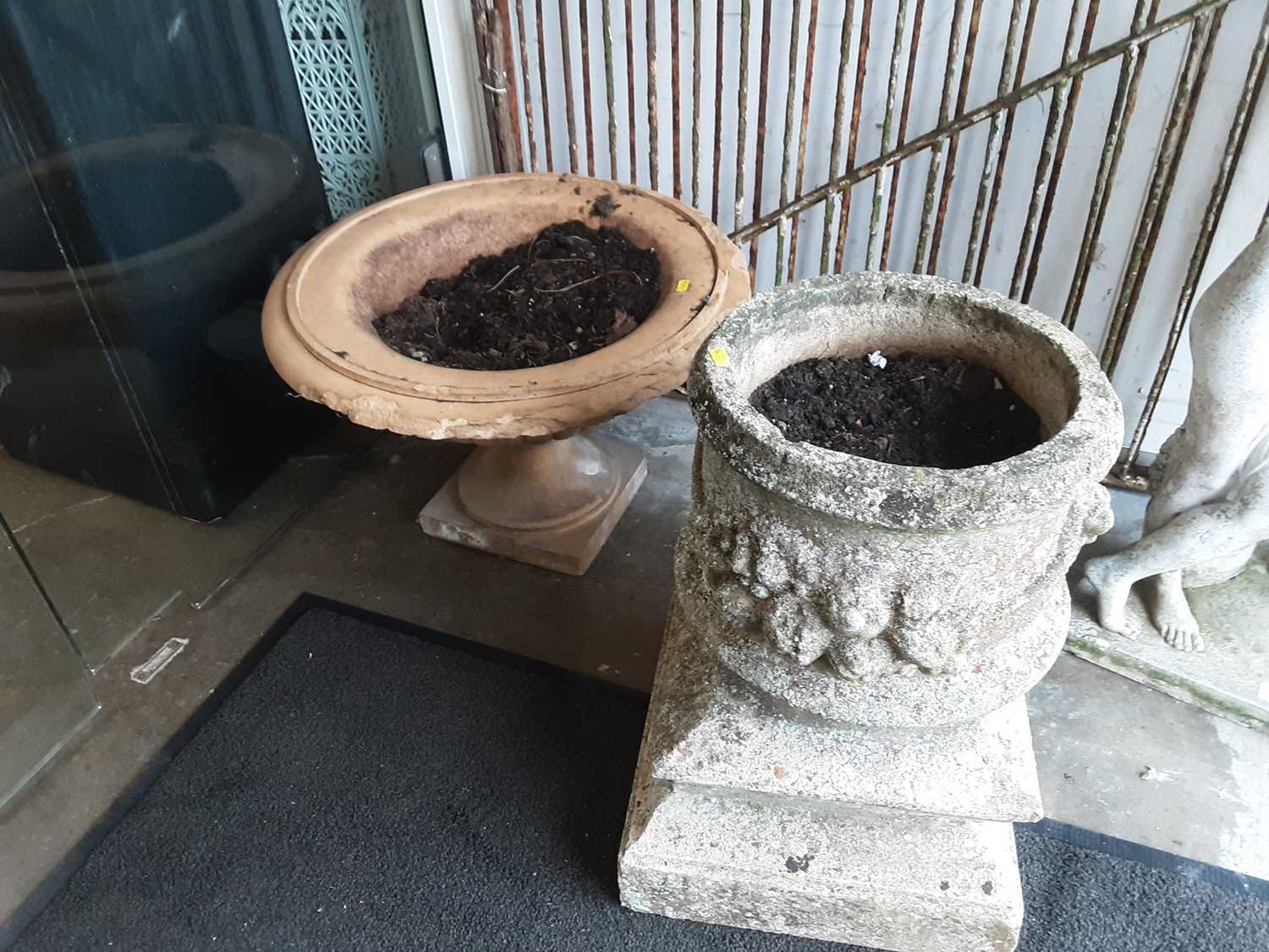 Lot 1083 Concrete garden urn, 52cm high and one