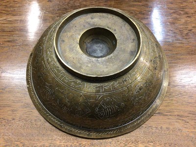 Lot 586 - Eastern brass bowl with engraved Arabic script, 21cm diameter