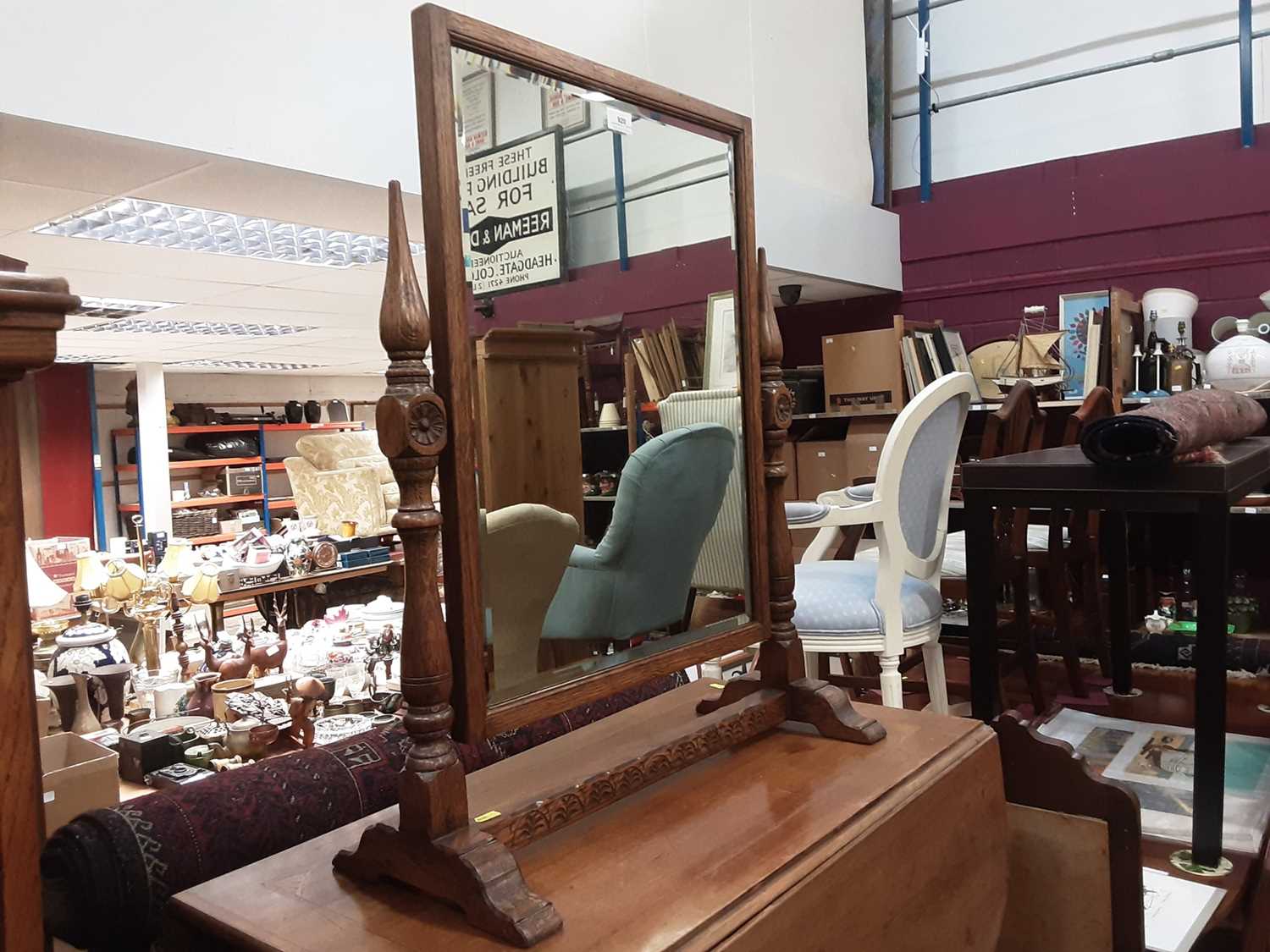 Lot 920 - Good quality bevelled dressing table mirror in carved oak frame and one other oak framed mirror