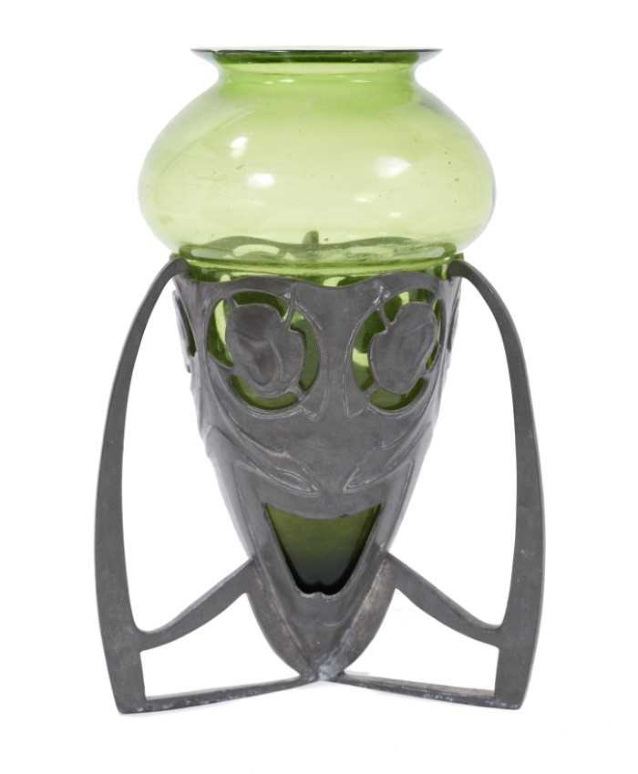 Lot 841 - Liberty & Co. pewter and green glass vase, designed by Archibald Knox