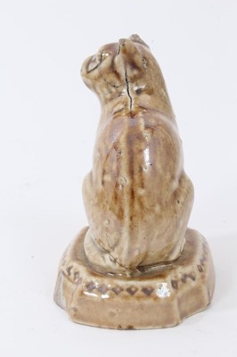 Lot 36 - A small lead glazed stoneware model of a cat, circa 1820