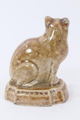 Lot 192 - A small lead glazed stoneware model of a cat, circa 1820
