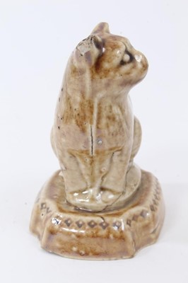 Lot 192 - A small lead glazed stoneware model of a cat, circa 1820