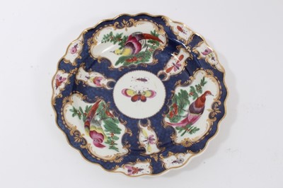 Lot 201 - A Worcester blue scale and birds plate, circa 1770