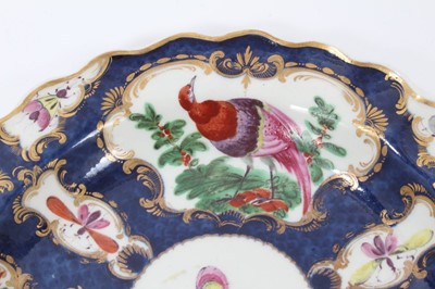 Lot 201 - A Worcester blue scale and birds plate, circa 1770
