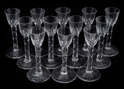 Lot 202 - A set of twelve George III wine glasses, each with diamond cut stem, circa 1760, probably Irish