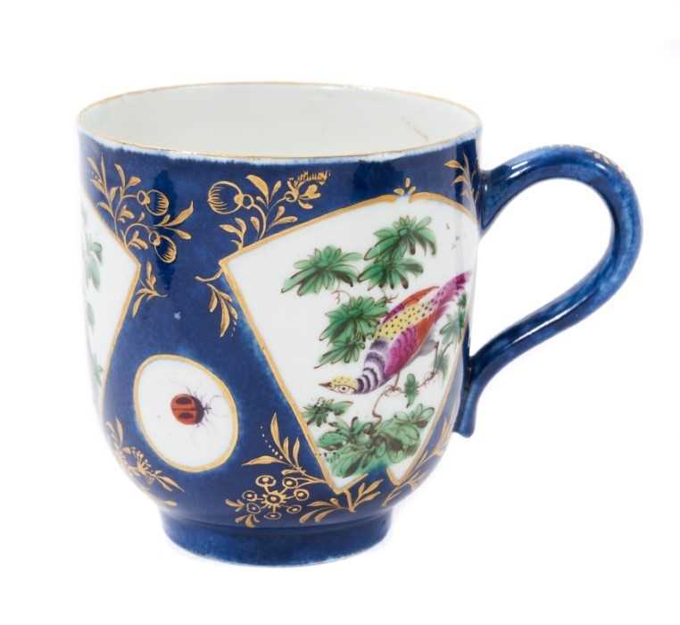 Lot 37 - A Worcester large coffee or chocolate cup, painted with exotic birds, on a powder blue ground, circa 1768