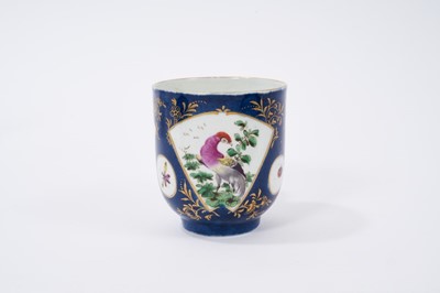 Lot 213 - A Worcester large coffee or chocolate cup, painted with exotic birds, on a powder blue ground, circa 1768