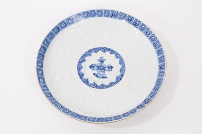 Lot 124 - A Bow blue and white moulded saucer, a Worcester faceted blue and white saucer and a Worcester tea bowl