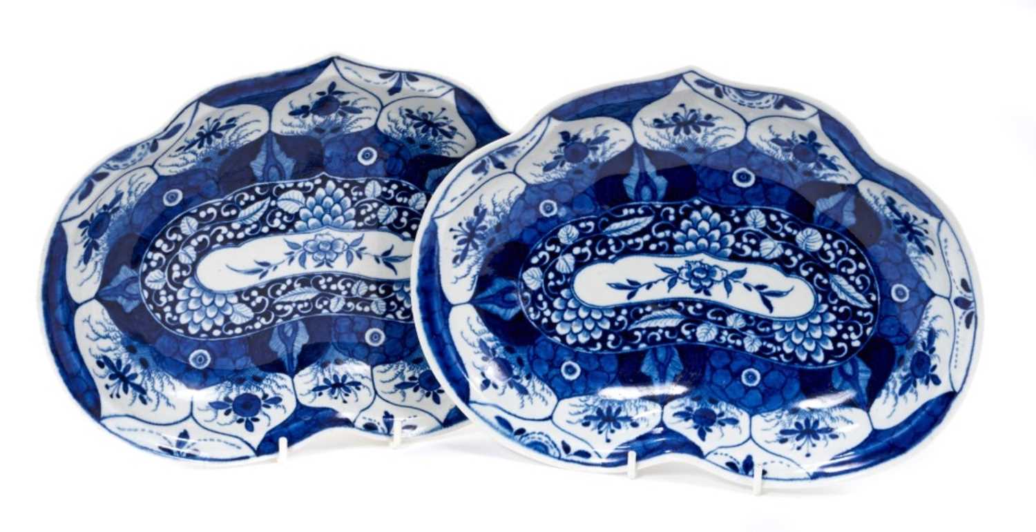 Lot 183 - A pair of Worcester 'Kangxi Lotus' pattern heart shaped dishes, circa 1770