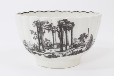 Lot 123 - A Worcester black printed saucer, a similar tea bowl, a Worcester small green ground mug and a polychrome tea bowl