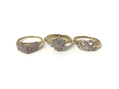 Lot 667 - Three 9ct gold diamond cluster rings