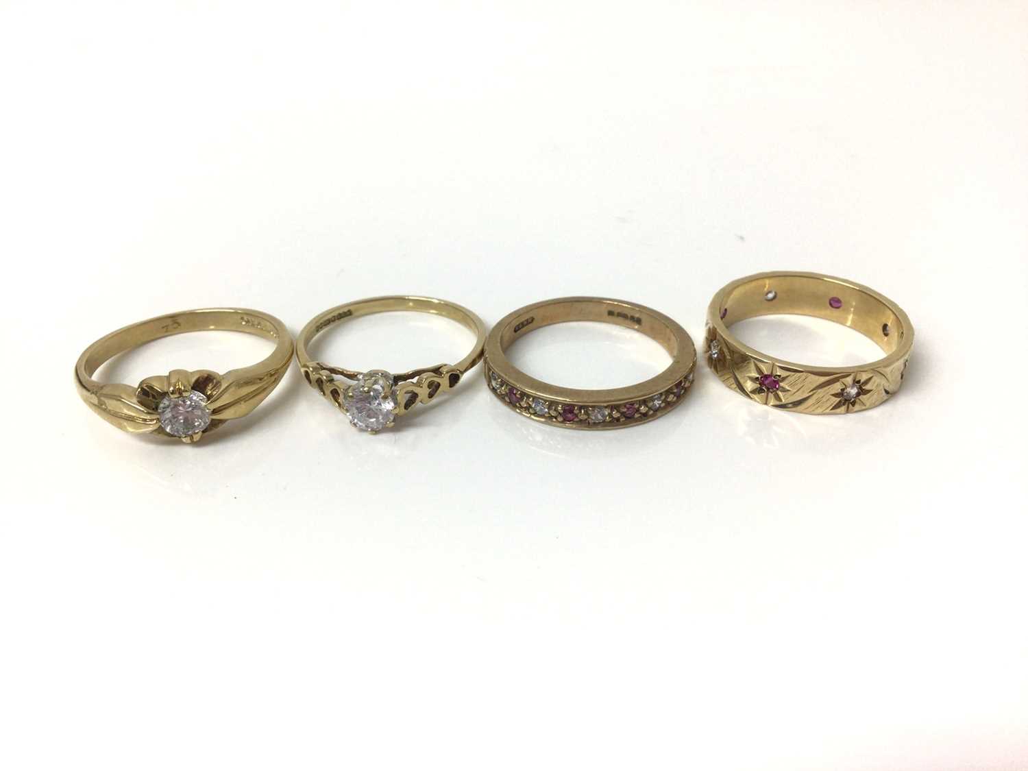 Lot 704 Four 9ct gold gem set dress rings