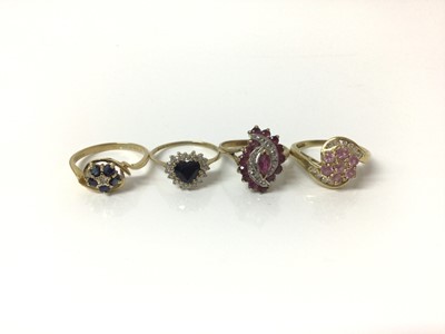 Lot 705 - Four 9ct gold diamond and gem set dress rings