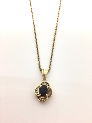 Lot 662 - 9ct gold sapphire and diamond pendant on 9ct gold chain