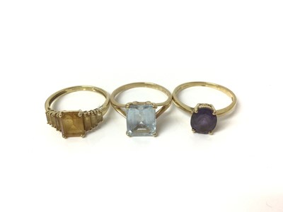 Lot 664 - Three 9ct gold gem set dress rings