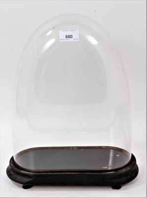 Lot 860 - Victorian glass dome on ebonized plinth