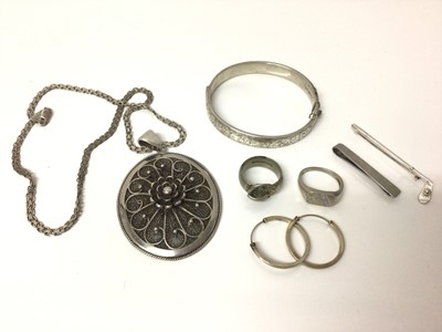 Lot 652 - 1960s silver bangle, Eastern white metal oval pendant on chain and other silver jewellery